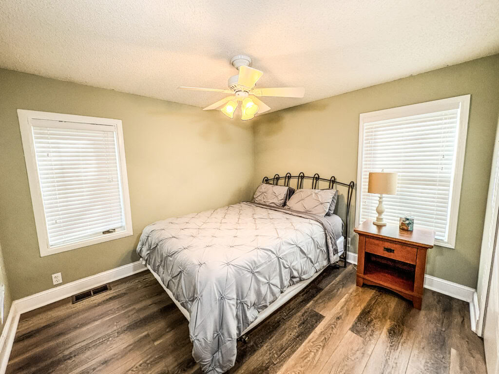 One Queen Bed with Shared Bathroom