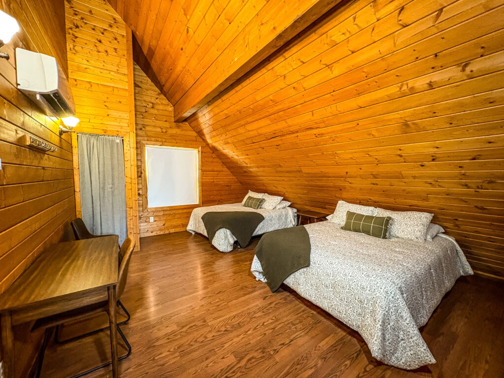 One Queen Loft Bed in a Shared Two Queen Cabin Loft with Shared Bathrooms