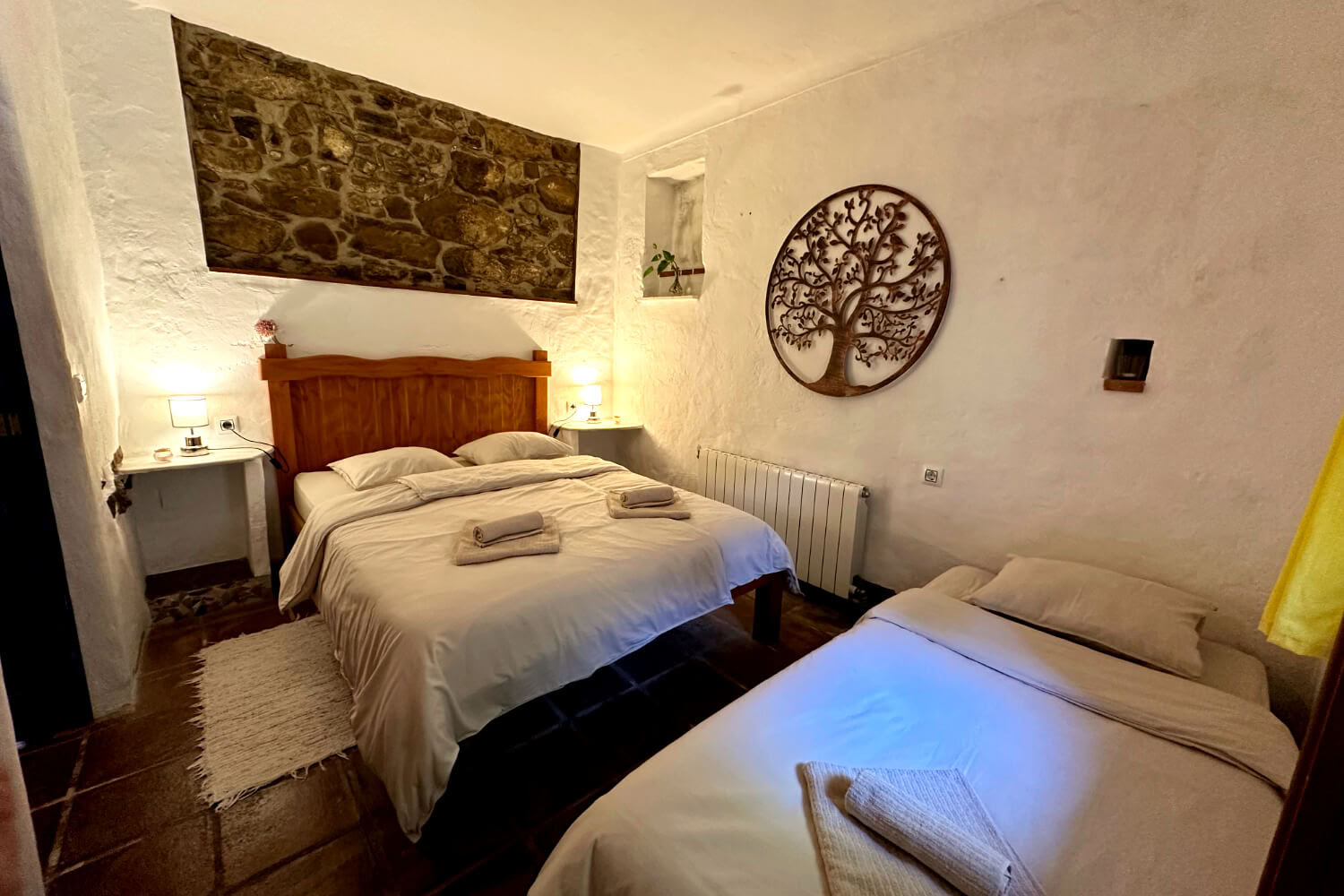 Double Room plus extra bed for 3 guests with shared bathroom